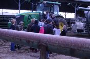 Students learn about farm equipment at the bit tractor exhigit