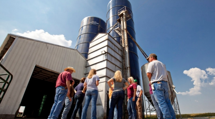 EKU students in front of silos at the farm