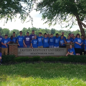 Farm Director Justin McKinney (far right) with KSD students