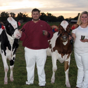 Billy Cameron and Celia Thomas with their champion heifers